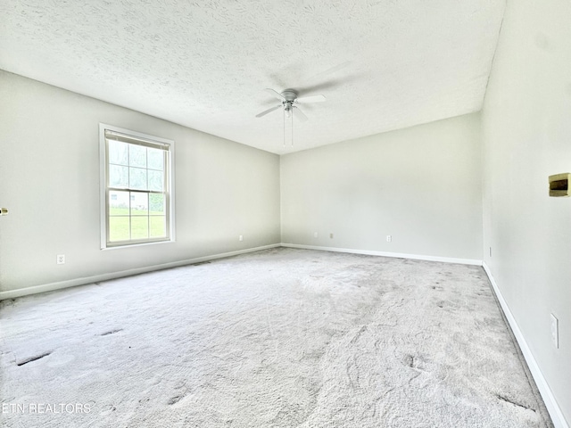 200 Harmon Cir, New Tazewell, TN 37825 - carpeted spare room with a ceiling fan, baseboards, and a textured ceiling