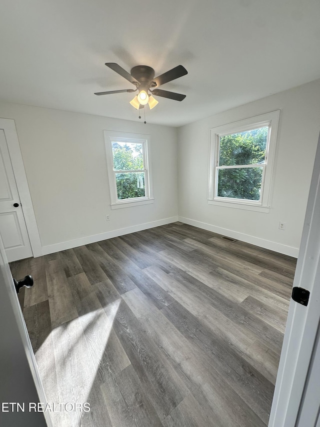 3824 Catalpa Ave, Knoxville, TN 37914 - spare room with dark wood-type flooring, ceiling fan, and baseboards