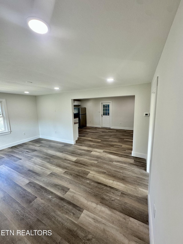3824 Catalpa Ave, Knoxville, TN 37914 - empty room with dark wood-style flooring, baseboards, and recessed lighting