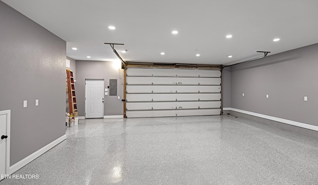 117 Mayview Dr, Powell, TN 37849 - garage featuring electric panel, baseboards, and recessed lighting