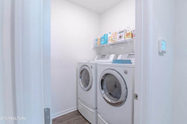 548 Cliff St, Morristown, TN 37814 - washroom with washer and dryer, wood finished floors, and baseboards