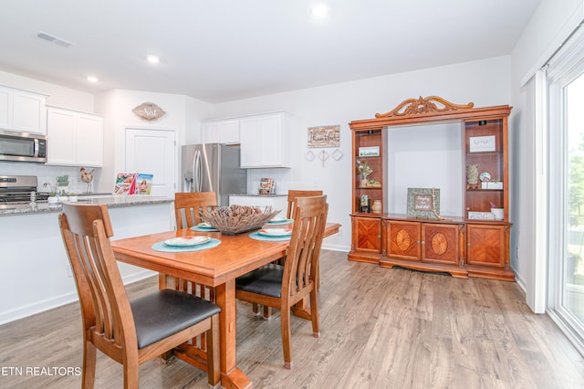548 Cliff St, Morristown, TN 37814 - dining room featuring light wood-style floors, recessed lighting, and baseboards