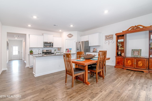 548 Cliff St, Morristown, TN 37814 - dining space featuring light wood-type flooring, baseboards, and recessed lighting
