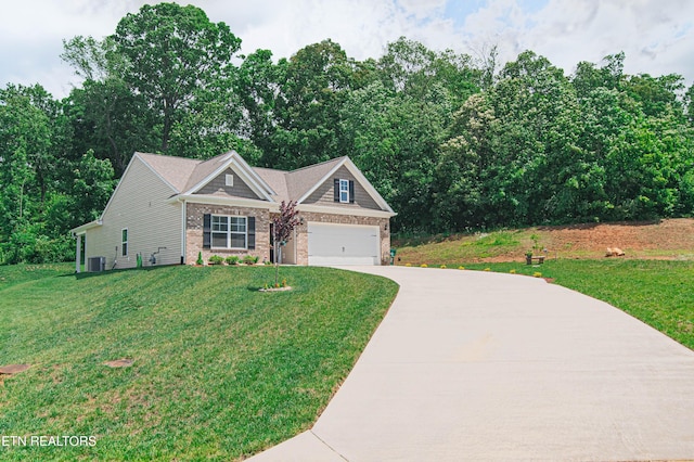 548 Cliff St, Morristown, TN 37814 - view of front of home with driveway, a front yard, central AC unit, and brick siding