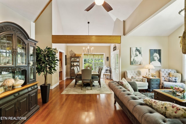 221 Stony Rock Ln, Jacksboro, TN 37757 - living area with a chandelier, wood finished floors, a ceiling fan, and high vaulted ceiling