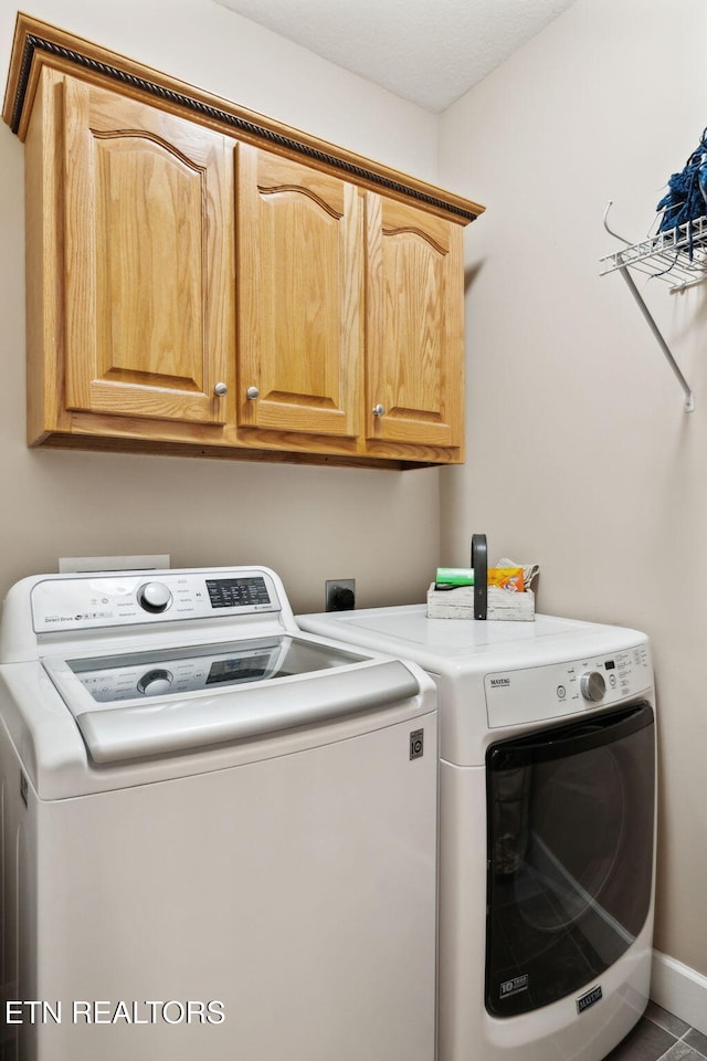 221 Stony Rock Ln, Jacksboro, TN 37757 - laundry area with cabinet space and washer and dryer