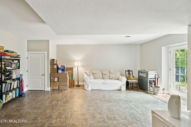 221 Stony Rock Ln, Jacksboro, TN 37757 - living room with a textured ceiling and baseboards