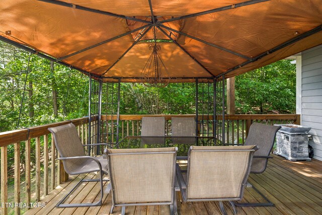 221 Stony Rock Ln, Jacksboro, TN 37757 - deck featuring outdoor dining space and a gazebo