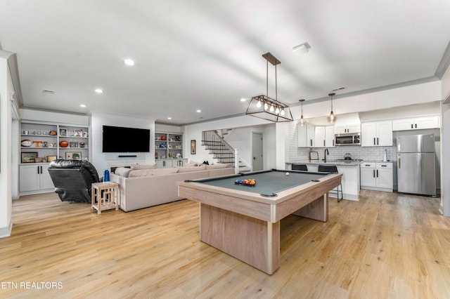 8539 N Ruggles Ferry Pike, Strawberry Plains, TN 37871 - recreation room with light wood-style floors, a sink, recessed lighting, and billiards table