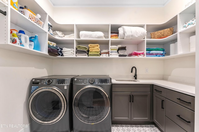 8539 N Ruggles Ferry Pike, Strawberry Plains, TN 37871 - laundry room featuring washer and clothes dryer, cabinet space, and light flooring