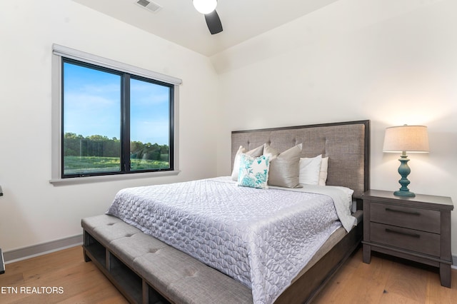 8539 N Ruggles Ferry Pike, Strawberry Plains, TN 37871 - bedroom with wood finished floors, a ceiling fan, and baseboards