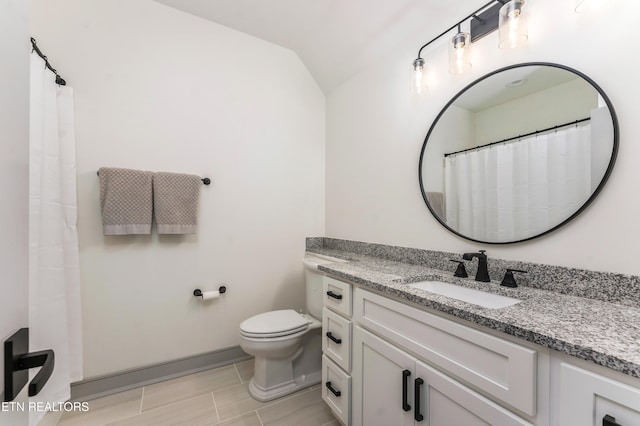 8539 N Ruggles Ferry Pike, Strawberry Plains, TN 37871 - full bathroom featuring vaulted ceiling, toilet, vanity, and baseboards