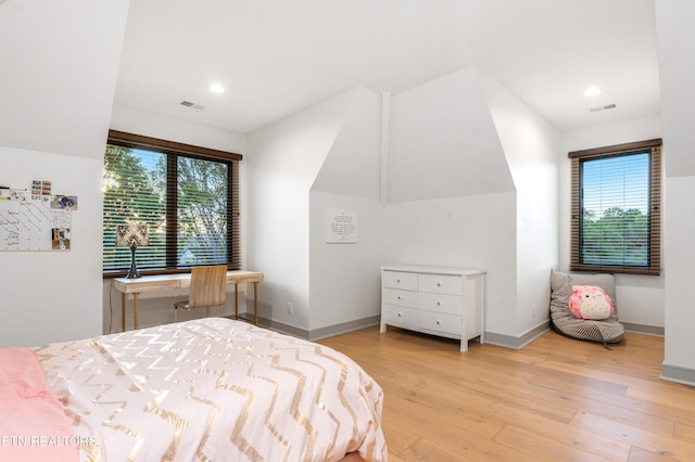 8539 N Ruggles Ferry Pike, Strawberry Plains, TN 37871 - bedroom featuring wood finished floors, recessed lighting, baseboards, and lofted ceiling