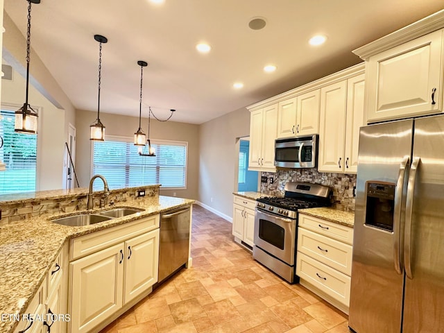 129 Canary Ct, Crossville, TN 38555 - kitchen with stainless steel appliances, a sink, tasteful backsplash, recessed lighting, and baseboards