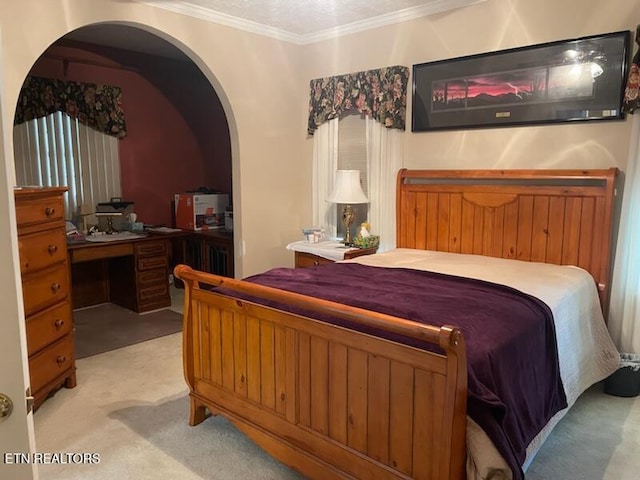 203 Hawthorn Loop, Crossville, TN 38555 - bedroom featuring light colored carpet, crown molding, a desk, and arched walkways