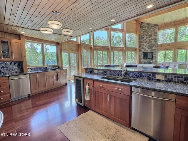 189 Bridle Way, Speedwell, TN 37870 - kitchen featuring stainless steel dishwasher, a sink, wooden ceiling, wine cooler, and backsplash