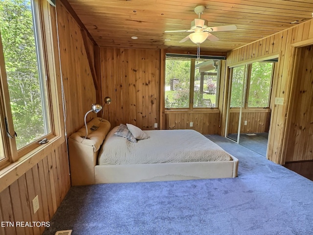 189 Bridle Way, Speedwell, TN 37870 - carpeted bedroom featuring wood walls, wood ceiling, and ceiling fan