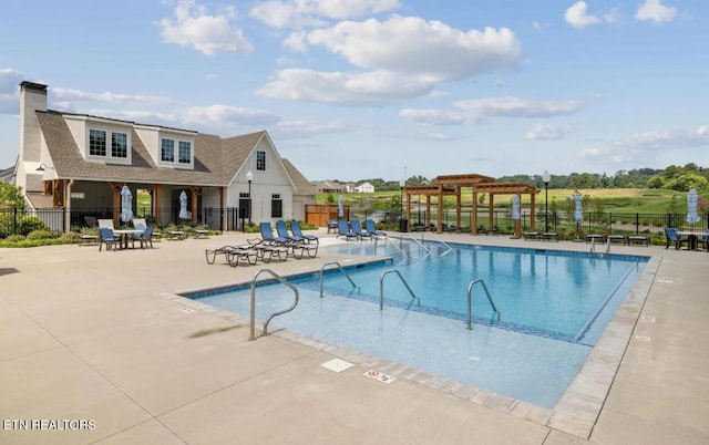 12713 Duckfoot Ln, Farragut, TN 37934 - community pool with a pergola, fence, and a patio area
