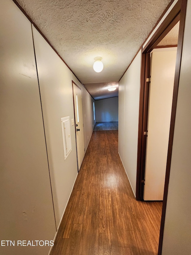 334 Corrington Ln, Lafollette, TN 37766 - hallway with dark wood-style floors and a textured ceiling