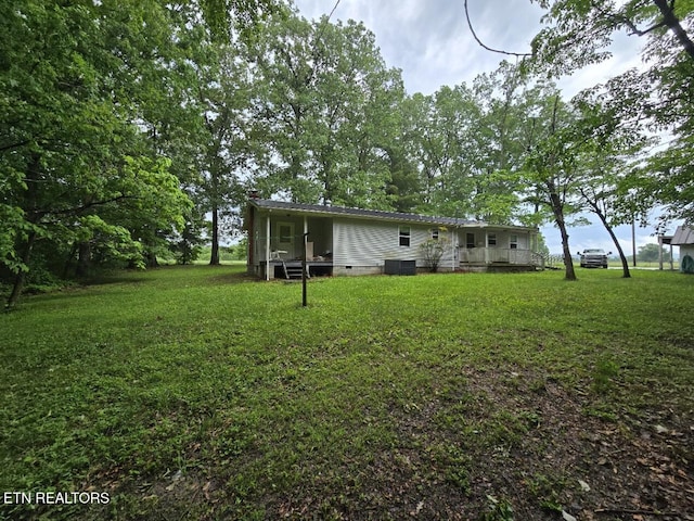 288 Andy Ln, Winfield, TN 37892 - view of grassy yard with central AC