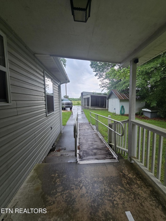 288 Andy Ln, Winfield, TN 37892 - view of patio with an outbuilding