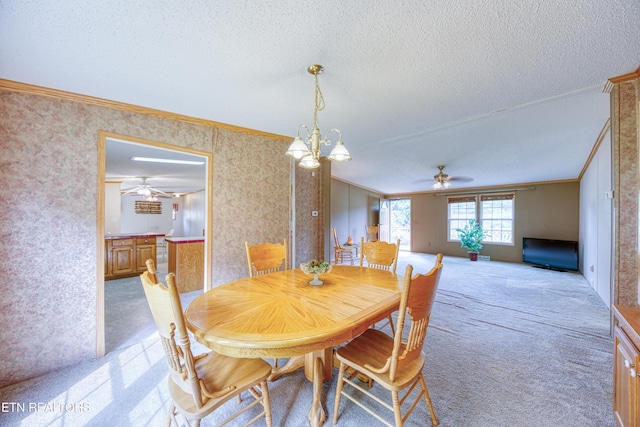 310 Abbott Rd, Lenoir City, TN 37771 - dining area with ornamental molding, a ceiling fan, light colored carpet, a textured ceiling, and wallpapered walls
