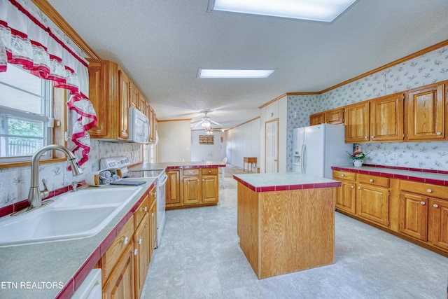 310 Abbott Rd, Lenoir City, TN 37771 - kitchen with white appliances, a sink, crown molding, wallpapered walls, and light flooring