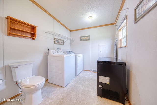 310 Abbott Rd, Lenoir City, TN 37771 - laundry room featuring separate washer and dryer, ornamental molding, and a textured ceiling