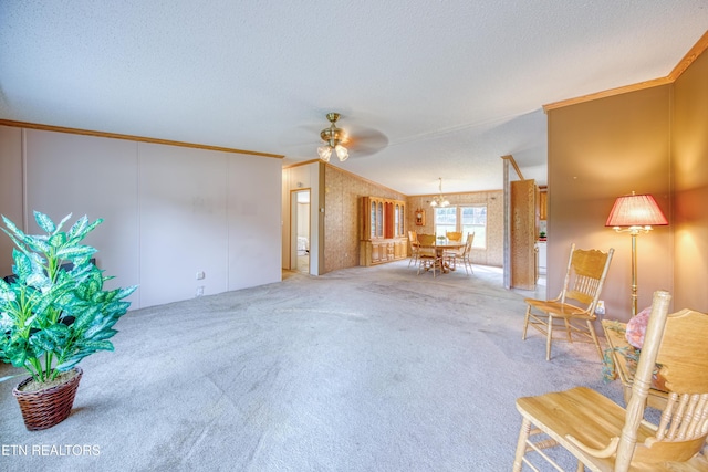 310 Abbott Rd, Lenoir City, TN 37771 - living room featuring a ceiling fan, a textured ceiling, and carpet flooring