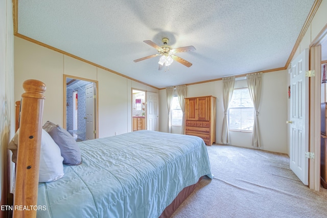 310 Abbott Rd, Lenoir City, TN 37771 - bedroom with ornamental molding, carpet flooring, a textured ceiling, ceiling fan, and vaulted ceiling