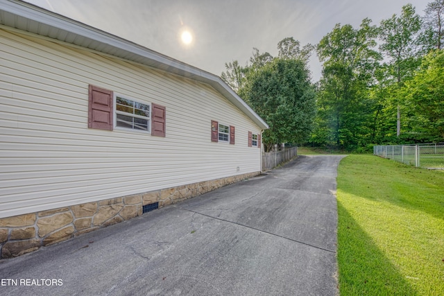 310 Abbott Rd, Lenoir City, TN 37771 - view of property exterior featuring crawl space and driveway