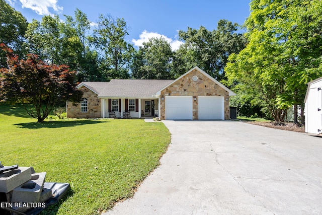 348 Willie D Dr, Jefferson City, TN 37760 - ranch-style home featuring stone siding, an attached garage, a front lawn, and driveway