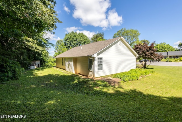 348 Willie D Dr, Jefferson City, TN 37760 - view of property exterior with a lawn and roof with shingles