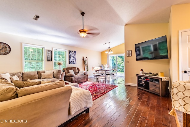 348 Willie D Dr, Jefferson City, TN 37760 - living room with dark wood finished floors, lofted ceiling, a ceiling fan, baseboards, and a chandelier
