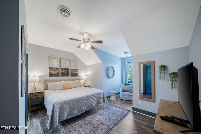 bedroom featuring dark wood-style floors, baseboards, and ceiling fan
