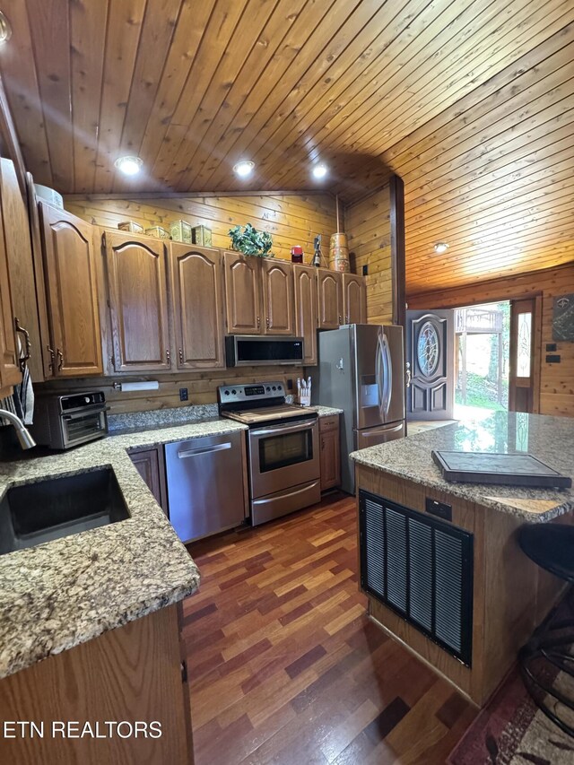 1186 Deerfield Way, Lafollette, TN 37766 - kitchen with stainless steel appliances, a sink, wood ceiling, dark wood-style flooring, and light stone counters