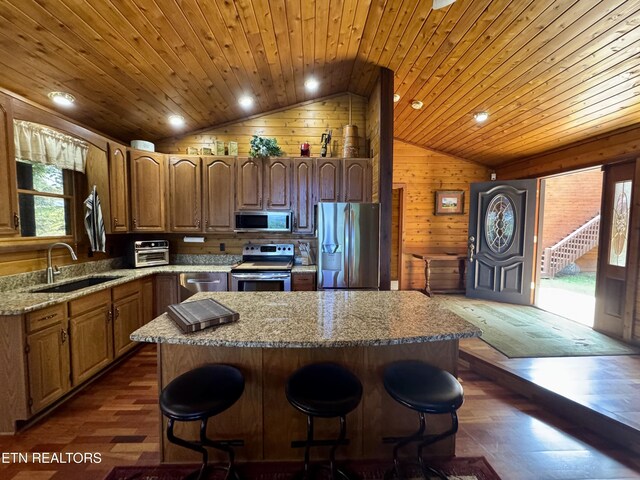 1186 Deerfield Way, Lafollette, TN 37766 - kitchen featuring stainless steel appliances, a sink, lofted ceiling, wood ceiling, and a center island