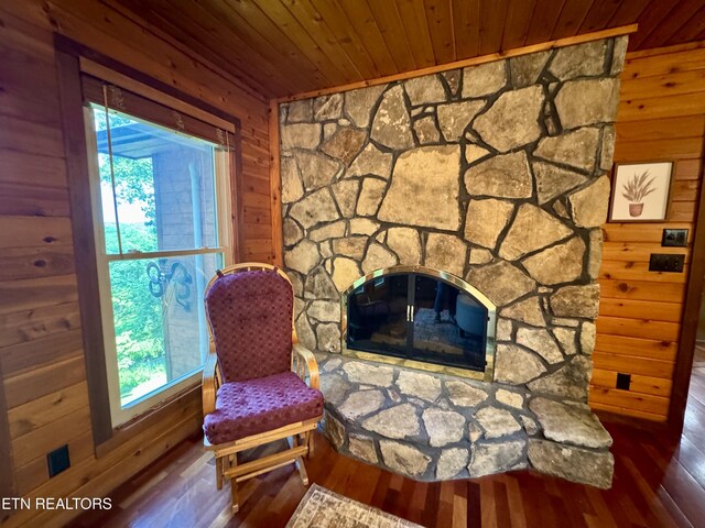 1186 Deerfield Way, Lafollette, TN 37766 - sitting room with wooden walls, wood ceiling, wood-type flooring, plenty of natural light, and a fireplace