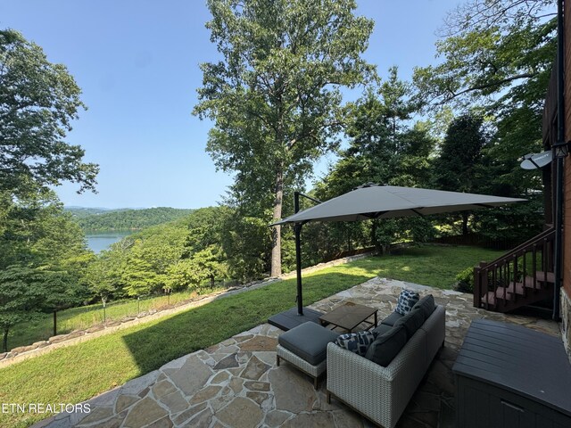 1186 Deerfield Way, Lafollette, TN 37766 - view of patio / terrace with stairway and a water view