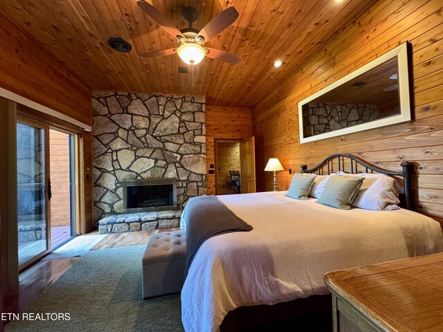 1186 Deerfield Way, Lafollette, TN 37766 - bedroom with access to outside, wood walls, wooden ceiling, wood finished floors, and a fireplace