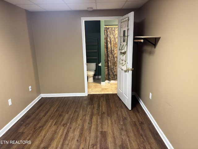 211 Jamie St, Maynardville, TN 37807 - unfurnished bedroom with a paneled ceiling, wood finished floors, baseboards, and ensuite bathroom