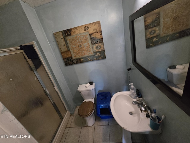 291 Tall Oaks Dr, Pennington Gap, VA 24277 - full bath with a shower stall, toilet, tile patterned floors, and a sink