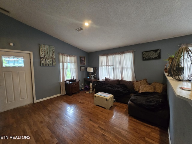291 Tall Oaks Dr, Pennington Gap, VA 24277 - living area featuring a textured ceiling, lofted ceiling, wood finished floors, and baseboards