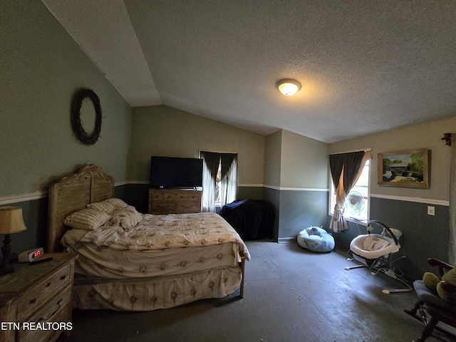 291 Tall Oaks Dr, Pennington Gap, VA 24277 - bedroom with lofted ceiling, a textured ceiling, and baseboards