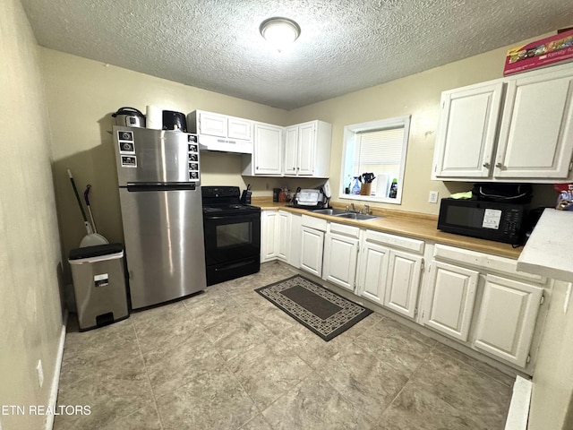 108 E Hunter Cir, Oak Ridge, TN 37830 - kitchen with black appliances, a sink, white cabinets, light countertops, and a textured ceiling