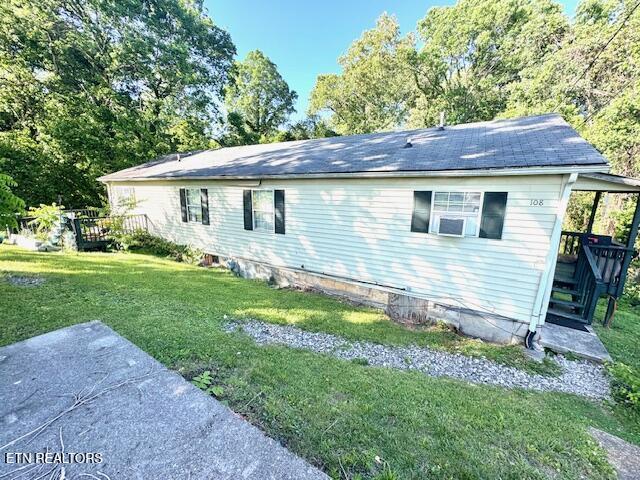 108 E Hunter Cir, Oak Ridge, TN 37830 - view of side of home featuring a yard