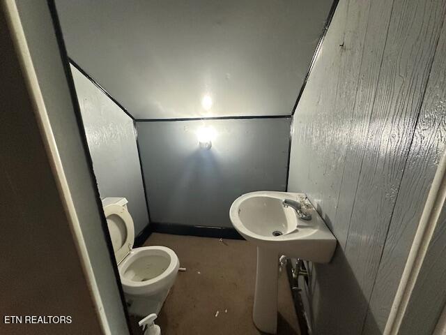 156 Beatty Rd, Rose Hill, VA 24281 - half bathroom with toilet, wood walls, and a sink