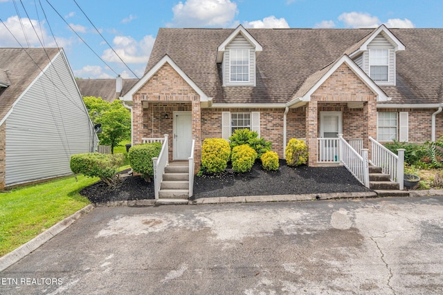 1051 Nod St, Knoxville, TN 37932 - view of front of property featuring brick siding and roof with shingles