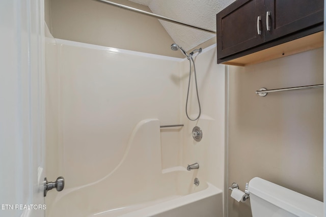 1051 Nod St, Knoxville, TN 37932 - bathroom with a textured ceiling, toilet, and shower / bathtub combination