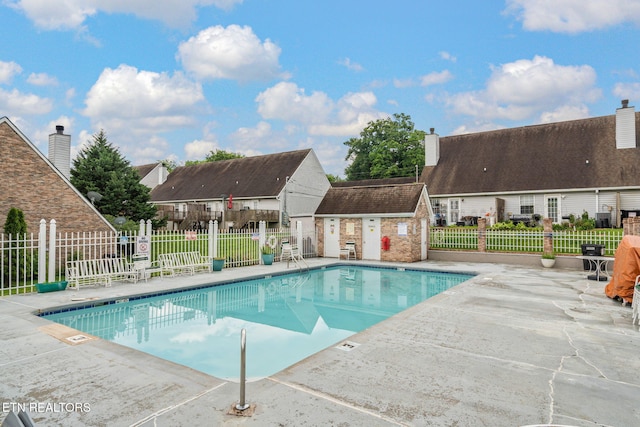 1051 Nod St, Knoxville, TN 37932 - community pool featuring a patio and fence